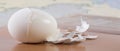 Half-peeled white boiled egg Royalty Free Stock Photo