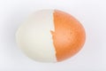 Half peeling of hard shell boiled egg isolate on white background. Royalty Free Stock Photo