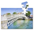 Half penny bridge the most famous bridge in Dublin - Ireland - Concept image in jigsaw puzzle shape with copy space Royalty Free Stock Photo