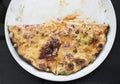 Half pizza in a plate Royalty Free Stock Photo
