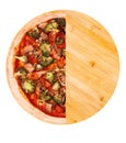 Half of pizza with veggie vegetables, on bamboo bottom isolate