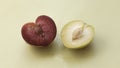 Half of Plumcot and Yellow Plum fruit Royalty Free Stock Photo