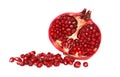 A half pomegranate with seeds (isolated) Royalty Free Stock Photo