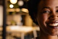 Half portrait of happy african american casual businesswoman with afro in office, copy space Royalty Free Stock Photo