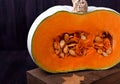 Half of a pumpkin with orange flesh Royalty Free Stock Photo