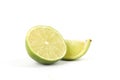 A half and a quarter of a lime isolated on white