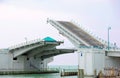 Half raised drawbridge with wild birds