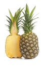 Half of ripe pineapple and whole fruit on white background Royalty Free Stock Photo