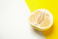 Half of ripe pomelo fruit on two tone background Royalty Free Stock Photo