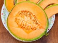 Half of ripe sicilian cantaloupe melon close up