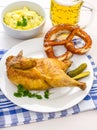 Half roast chicken, beer, pretzel and potato salad