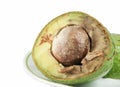 Half rotten avocado on white background