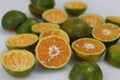 Half sliced Nagpur oranges along with a bowl of black chia seeds Royalty Free Stock Photo