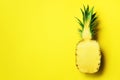 Half of sliced pineapple on yellow background. Top View. Copy Space. Bright pattern for minimal style. Pop art design Royalty Free Stock Photo