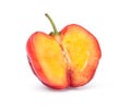 Half slices of ripe Acerola Cherry fruit isolated on white
