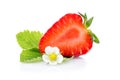 Half of strawberry with leaves and blossom Royalty Free Stock Photo
