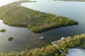 Half sunken sailing yacht capsized on shallow bay waters after hurricane Ian in Manasota, Florida Royalty Free Stock Photo