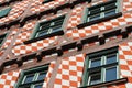 Half-timbered facade with colorful paint coating