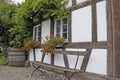 Half-Timbered House With Bench