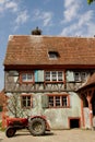 Half timbered house in a village in Alsace Royalty Free Stock Photo