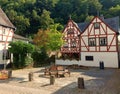 Half timbered houses and a bench in village Monreal in german region Eifel Royalty Free Stock Photo