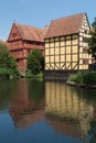 Old half timbered houses reflected in lake Royalty Free Stock Photo