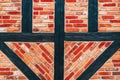 Half-timbered old house wall, brick wall pattern with timber framework. Detail from town of Halmstad in Sweden Royalty Free Stock Photo