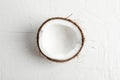 Half tropical coconut on white background