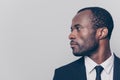 Half-turned side profile close up view portrait of handsome virile masculine attractive confident smart intelligent clever africa Royalty Free Stock Photo