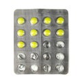 Half used pack of yellow pills isolated on white background. Royalty Free Stock Photo