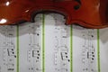 half violin with book music note background Royalty Free Stock Photo