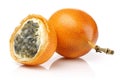 Half and whole granadilla passion fruit isolated