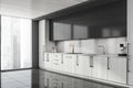 Half wooden grey kitchen with dark upper part of cabinet, panoramic view