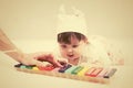 Half year baby girl playing with xylophone toy on blanket Royalty Free Stock Photo