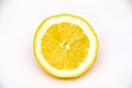 Half yellow very juicy lemon slice isolated