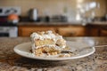 halfeaten cake with a fork resting on the plate sitting on kitchen counter