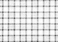 Halftone checkered grid pattern in black ink on paper macro Royalty Free Stock Photo