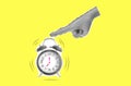 Halftone creative collage of human arm press button morning wake up work. Concept of coming deadline Royalty Free Stock Photo