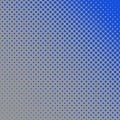 Halftone dot pattern background - vector graphic design from blue circles in varying sizes on grey background Royalty Free Stock Photo