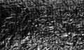 Halftone Grunge Texture.Distressed halftone grunge black and white scratches blurry shaded rough texture background. Royalty Free Stock Photo