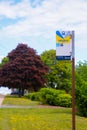 Halifax Transit bus stop information sign post with handicap access and stop number for tracking, Nova Scotia