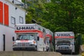 U-HAUL trucks parked at the pickup location at the rental office.