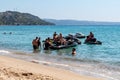 Blue sea and a jet ski floating on Aegean sea. Royalty Free Stock Photo