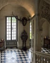 The hall in Cheverny castle, Loire valley, France with knight and skull of giant deer