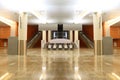 Hall with granite floor, columns and escalators Royalty Free Stock Photo