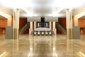 Hall with granite floor, columns and escalators