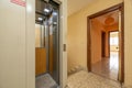 Hall of a house with elevator and armored door next Royalty Free Stock Photo