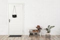 Hall interior with brick wall and white door Royalty Free Stock Photo