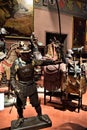 Hall with mannequins, covered with ancient armor, in the historic Stibbert villa in Florence.