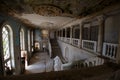 The hall of the mansion with a marble staircase and columns Royalty Free Stock Photo